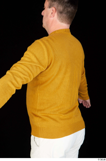 Paul Mc Caul casual dressed upper body yellow sweatshirt 0005.jpg